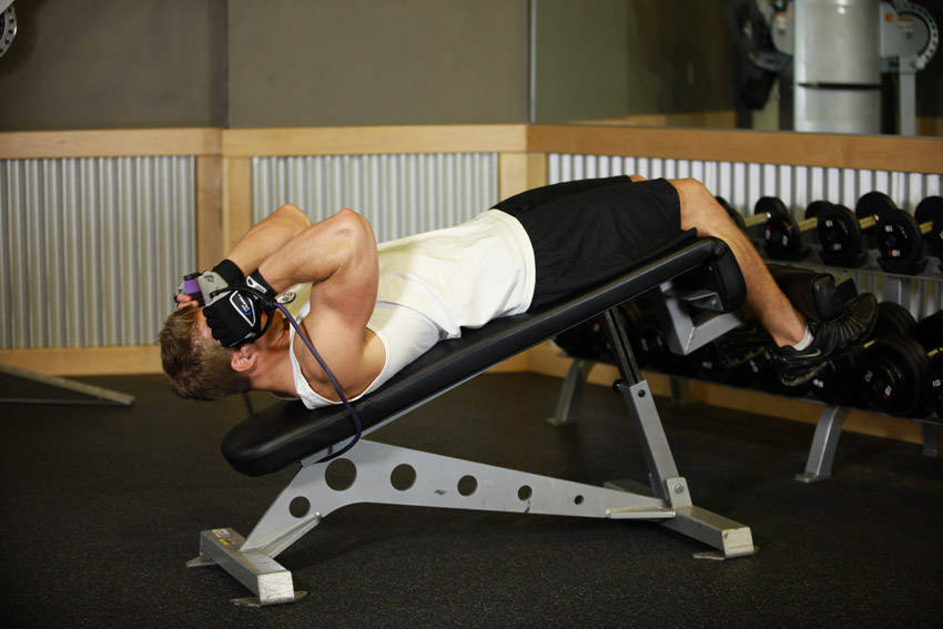 How to perform the Weighted Sit-Ups - With Bands exercise