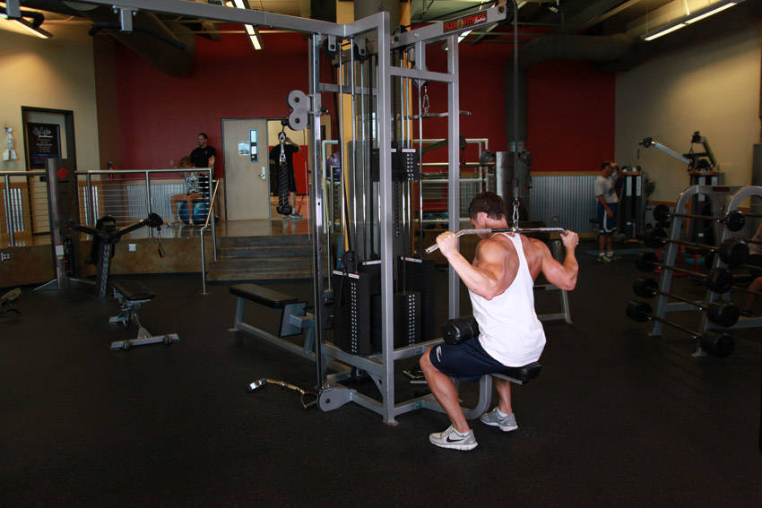 How to perform the Wide-Grip Pulldown Behind The Neck exercise