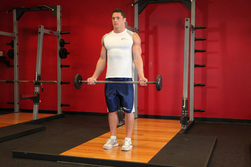 How to perform the Wide-Grip Standing Barbell Curl exercise