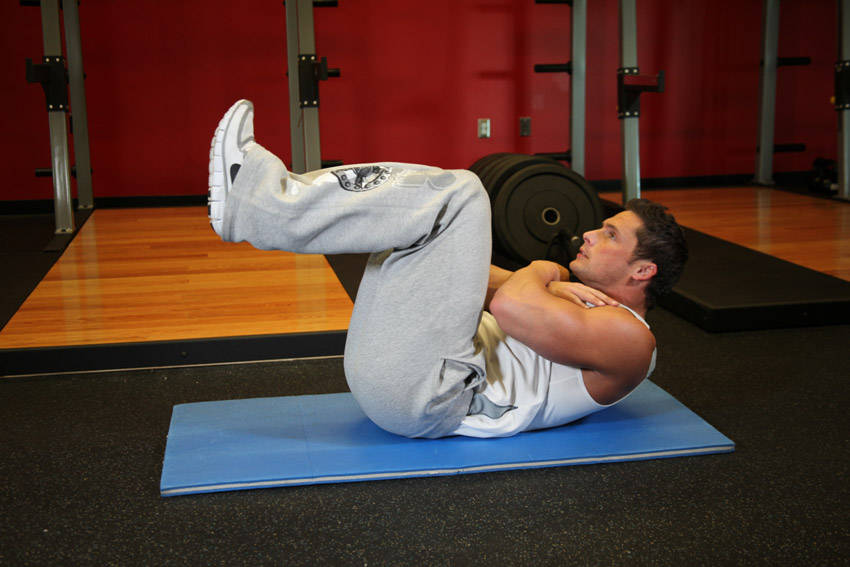 How to perform the Tuck Crunch exercise