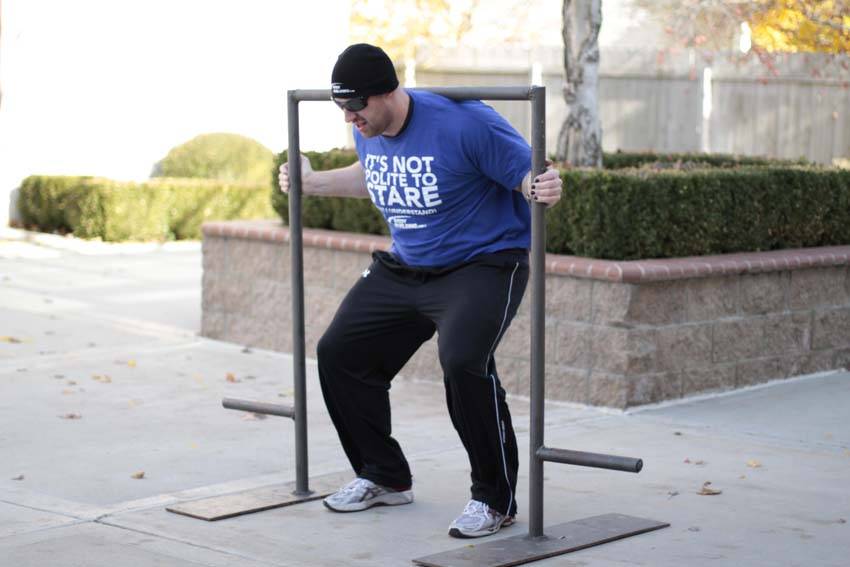 How to perform the Yoke Walk exercise